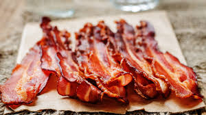 Air Fryer Oscar Mayer Center Cut Bacon up close on a napkin