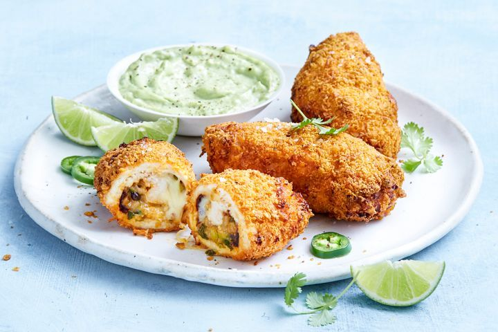 plate of perfectly cooked air fryer burrito-stuffed chicken