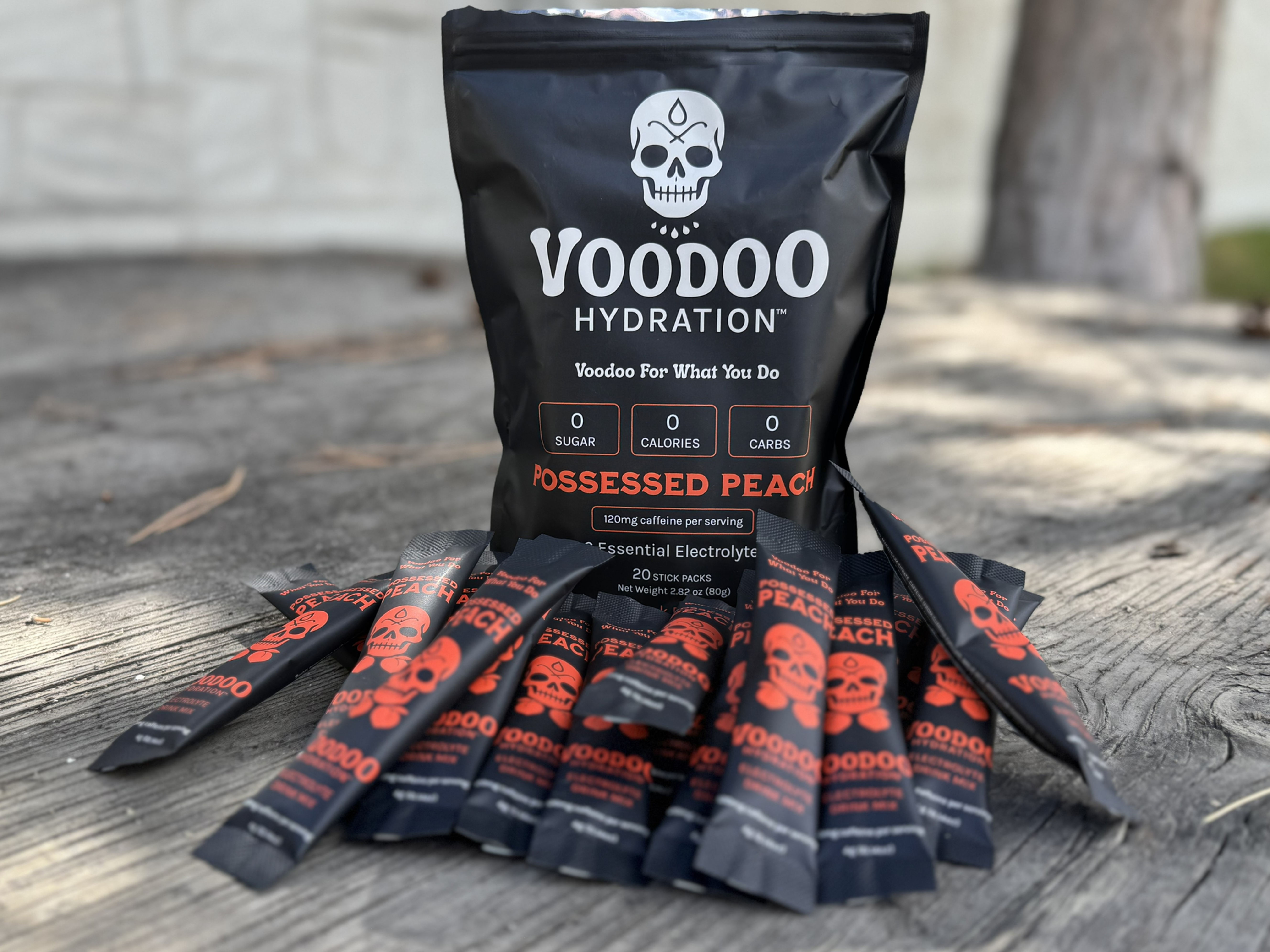 pouch of possessed peach surrounded by drink sticks