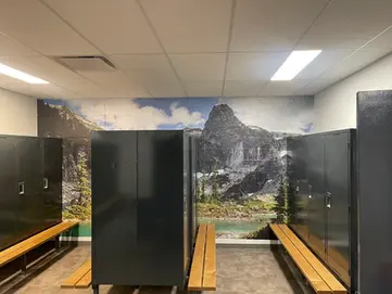 Wall graphic of a mountain range inside a locker room in Vancouver