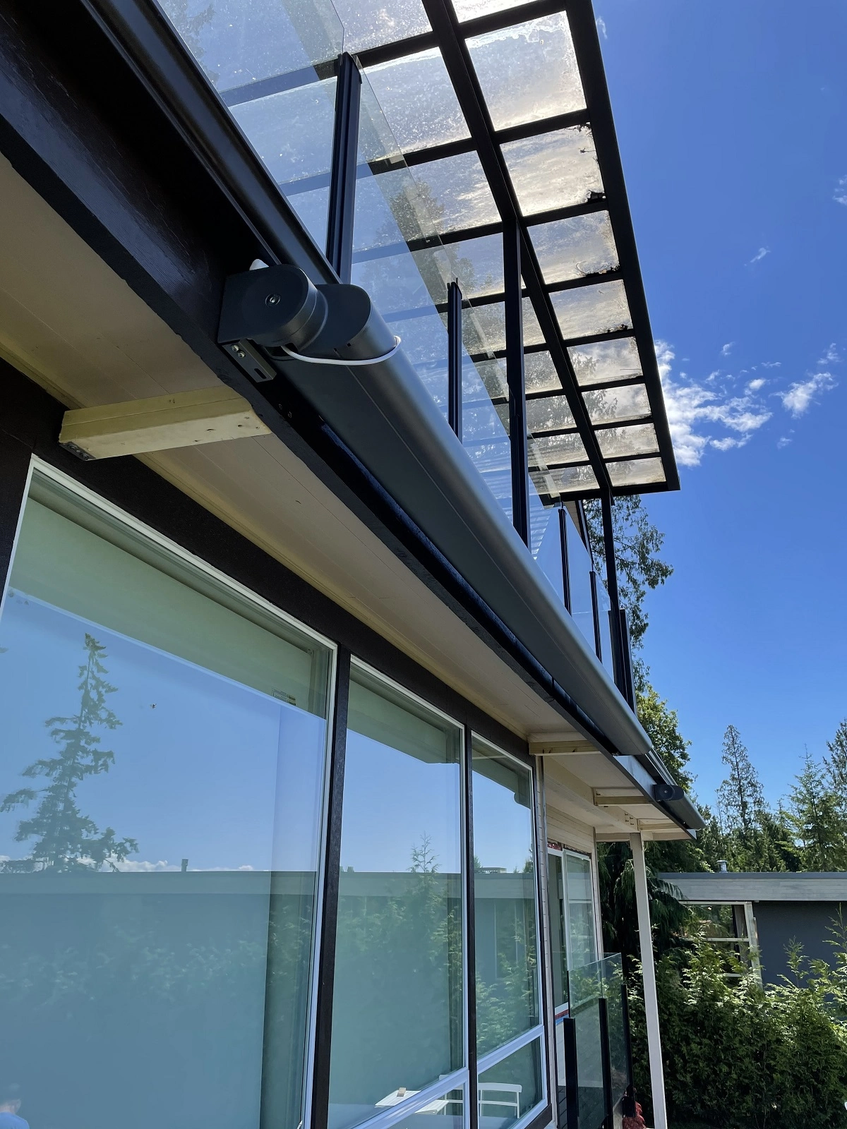 A close up of retractable awnings when rolled up on a full cassette.webp