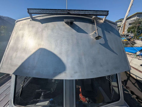 A closeup of a boat before wrapping it with graphics