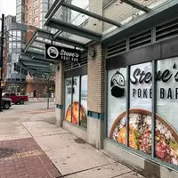 Printed window graphics at Steve's Poke Bar in downtown Vancouver