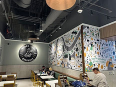 Beautiful Printed Vinyl Wall Graphics and a Dimensional Circular Sign at Bongo Java Nashvi