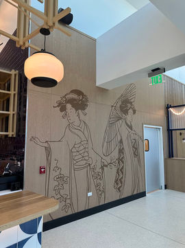A beautiful wall mural of two Japanese women inside the new Mizu Izakaya at Denver International Airport