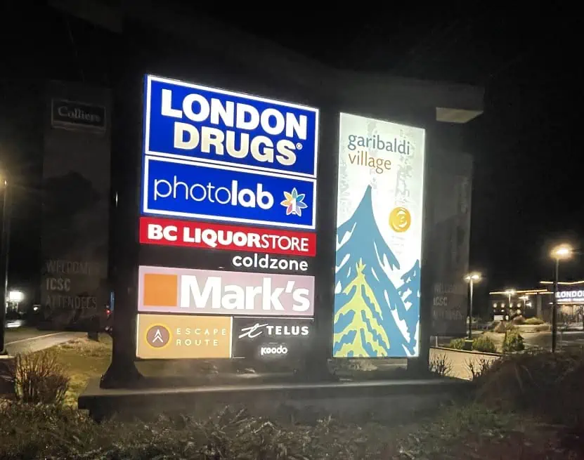Illuminated Pylon Sign at Night.webp