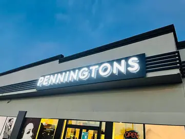 Pennington's Illuminated Storefront Sign up close