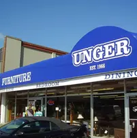 Giant storefront blue awning at Unger Furniture store