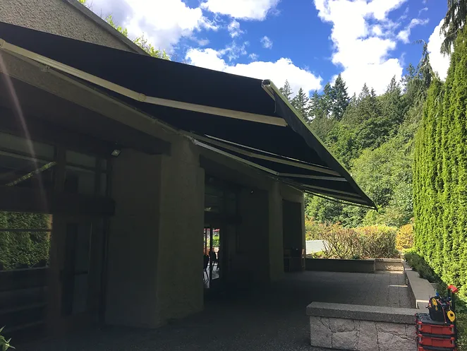 Retractable Awning on the side of the house with the beautiful Vancouver Landscape in the