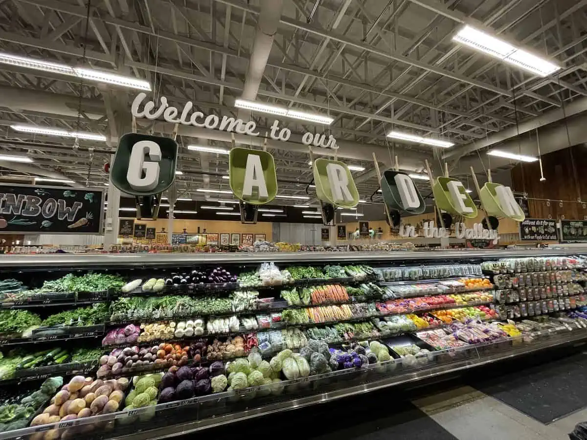 Interior Dimensional Letters inside a Grocery Store that reads Welcome to our GARDEN.webp