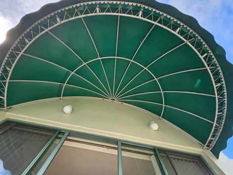 An underside of a building awning showcasing the frame structure in Surrey