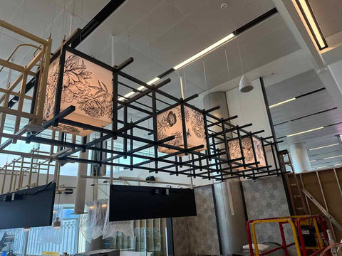 Custom backlit box graphics at Aviano Coffee inside the Denver International Airport