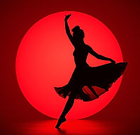 Silhouette of a dancer with a red backgrond.jpg