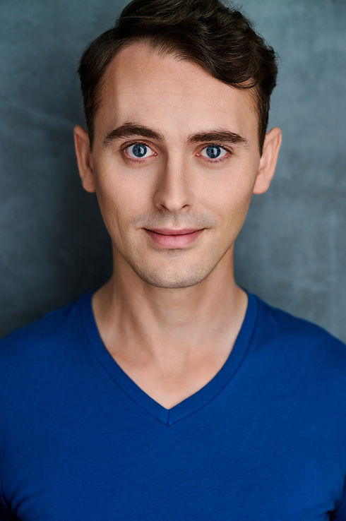 Headshot 1 retouch.jpg