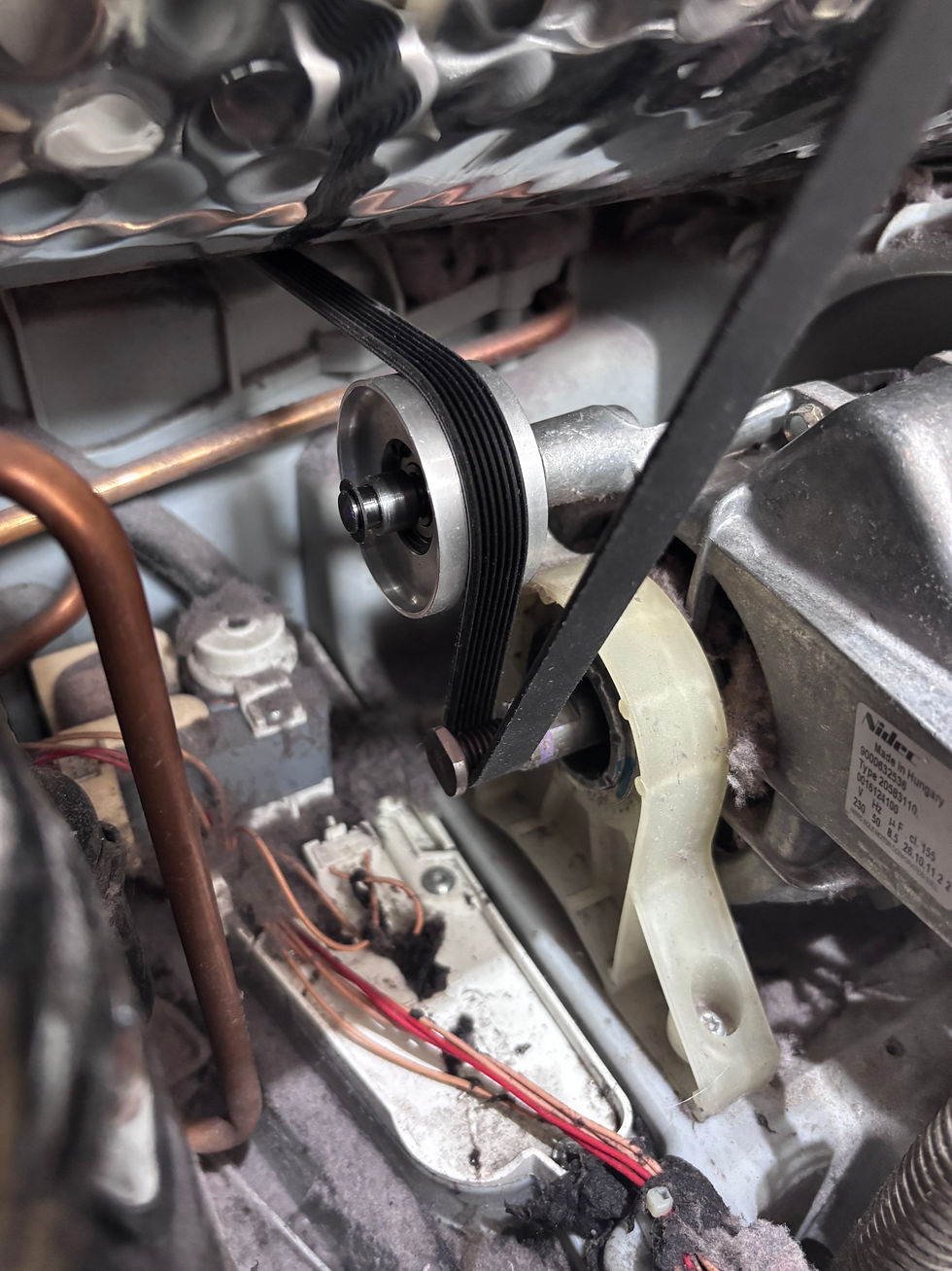 New pulley wheel and belt fitted.