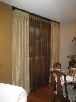 Operable pinch pleat sheer drapery