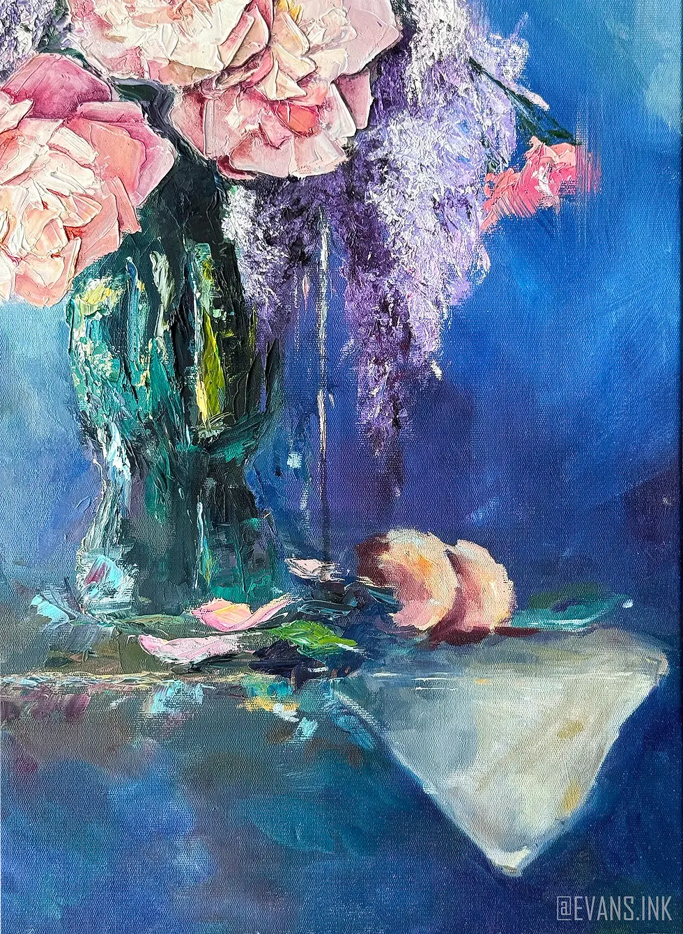 Original oil painting by Yana Evans of Pink and purple flowers in a textured green vase on a table with scattered petals. Blue background creates a serene, artistic mood.