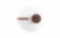 Espresso portafilter filled with coffee beans