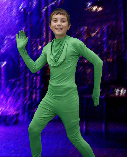 boy in a solid green form fitting costume