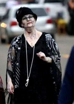 Woman in costume as 1920's flapper ghost