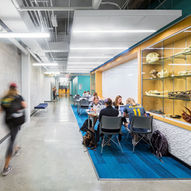 student collaborative space in hallway of college building 