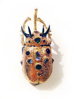 Rhino beetle brooch