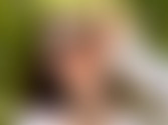 a woman wearing eyeglasses undeer the sun