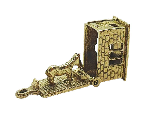 Thumbnail: Vintage 9ct gold Stable with horse charm showing the horse inside at the feed trough