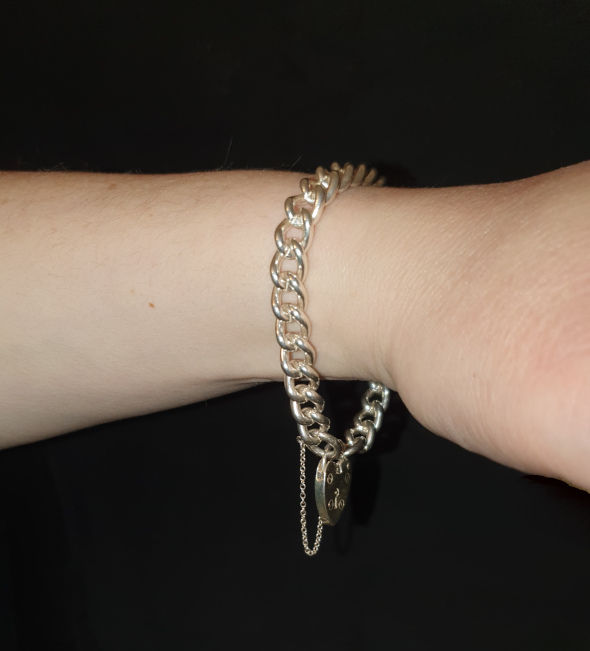 Thumbnail: Vintage Charm Bracelet in Sterling Silver, 32.1g shown on model's wrist