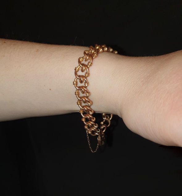 Thumbnail: Vintage Charm Bracelet in 9ct Rose Gold, 14.4g shown on model's wrist