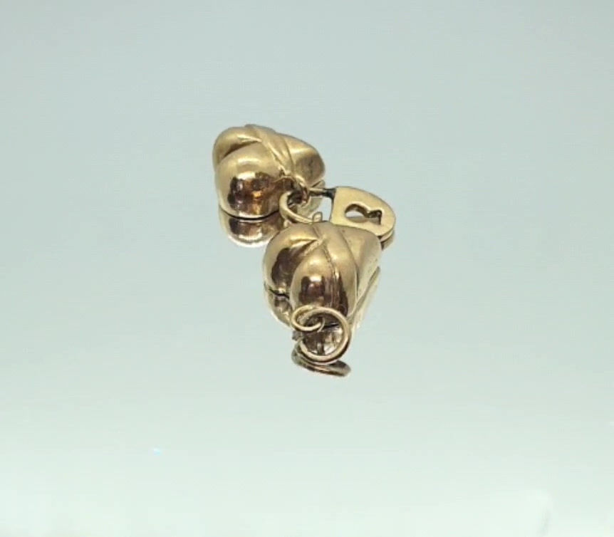 Thumbnail: Video of Vintage gold Twin  Padlocked Hearts charm