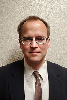 Yes, his hair is always like that; we don't know why. And no, he can't make his tie properly straight to save his life.