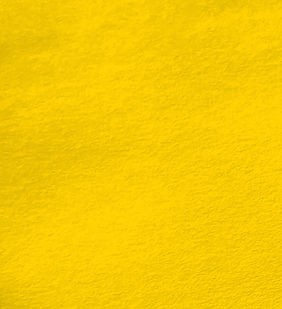 Vibrant yellow textile background, soft texture, solid color, close-up with light.