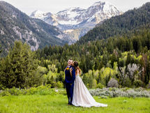 Bride and Groom on monutian at Tibble Fork in Pine trees
