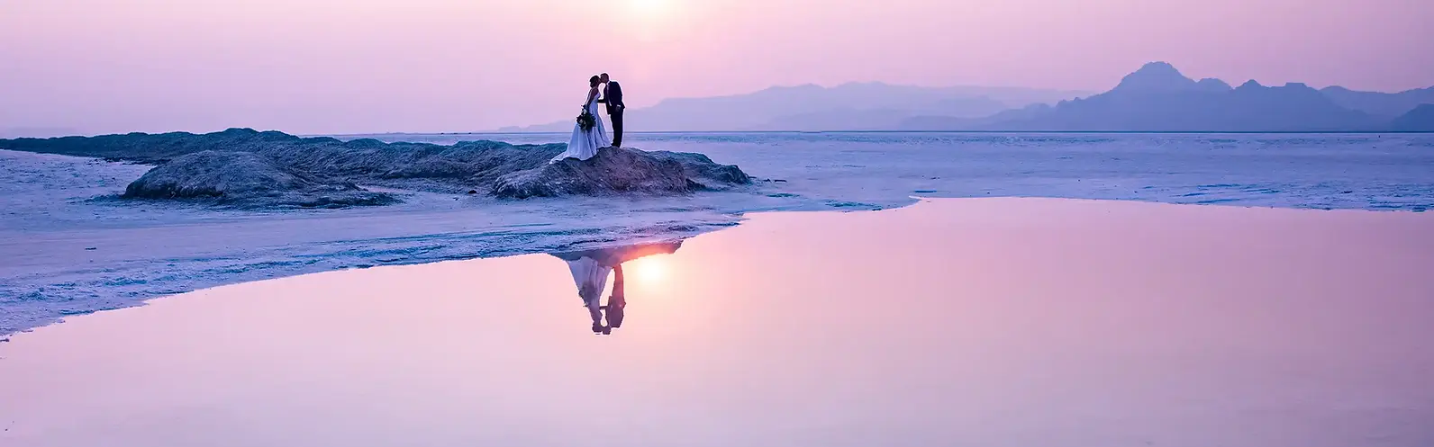 Bride and Groom Kissing at Antelope Island, Utah