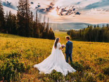 Bride and Groom in Utah field at sunset