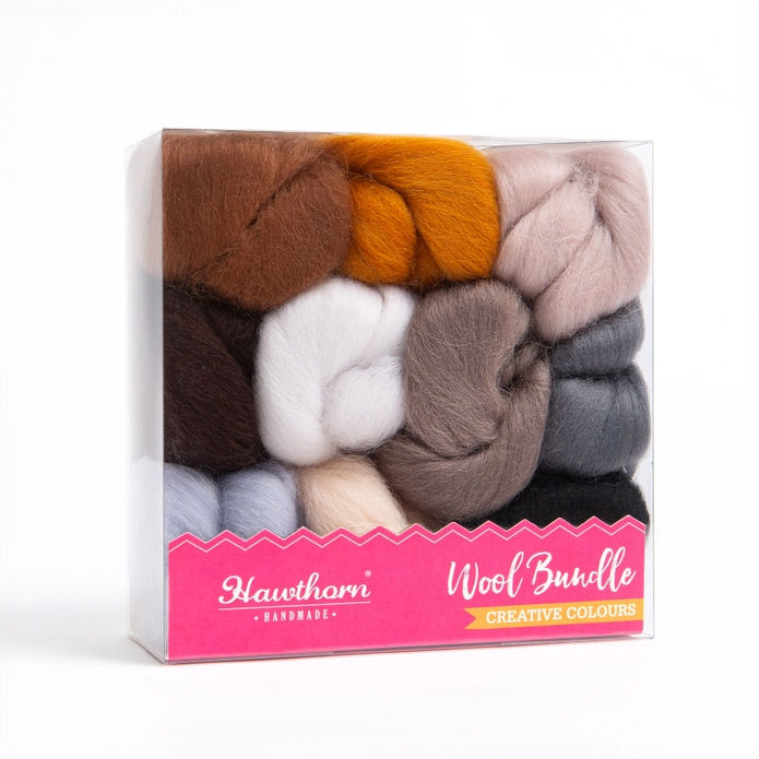 Animal coloured merino wools in a clear box
