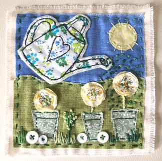 Slow stitch kit of a watering can and flowers in pots