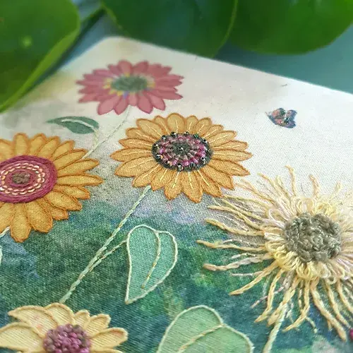 Thumbnail: Close up of the sun flowers embroidered