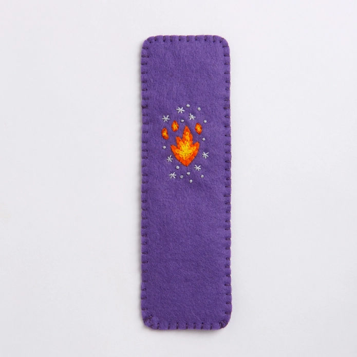 Thumbnail: Back of a purple bookmark showing an orange flame.