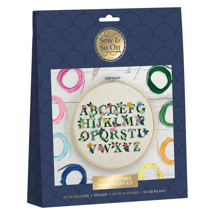 Navy blue packaging with a photo of the finished sampler on the front