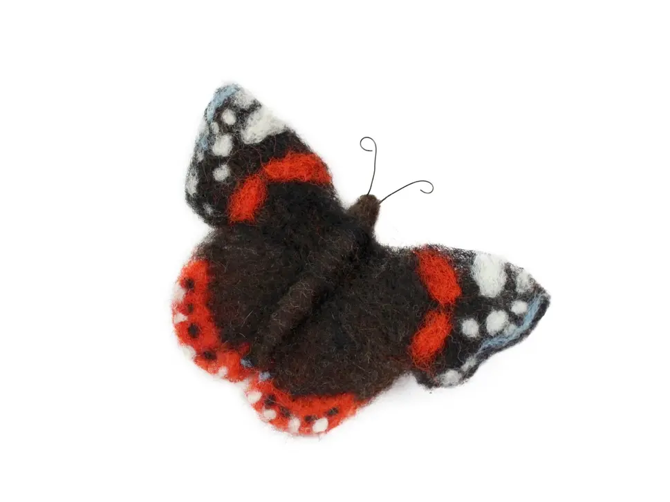 Looking down on a finished needle felted Red Admiral butterfly.