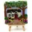 Thumbnail: View of a finished 2d thatched cottage needle with trees and flowers around, standing on a wooden easel.