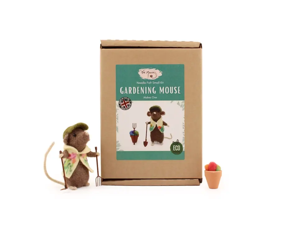 Garden mouse standing beside the boxed kit.