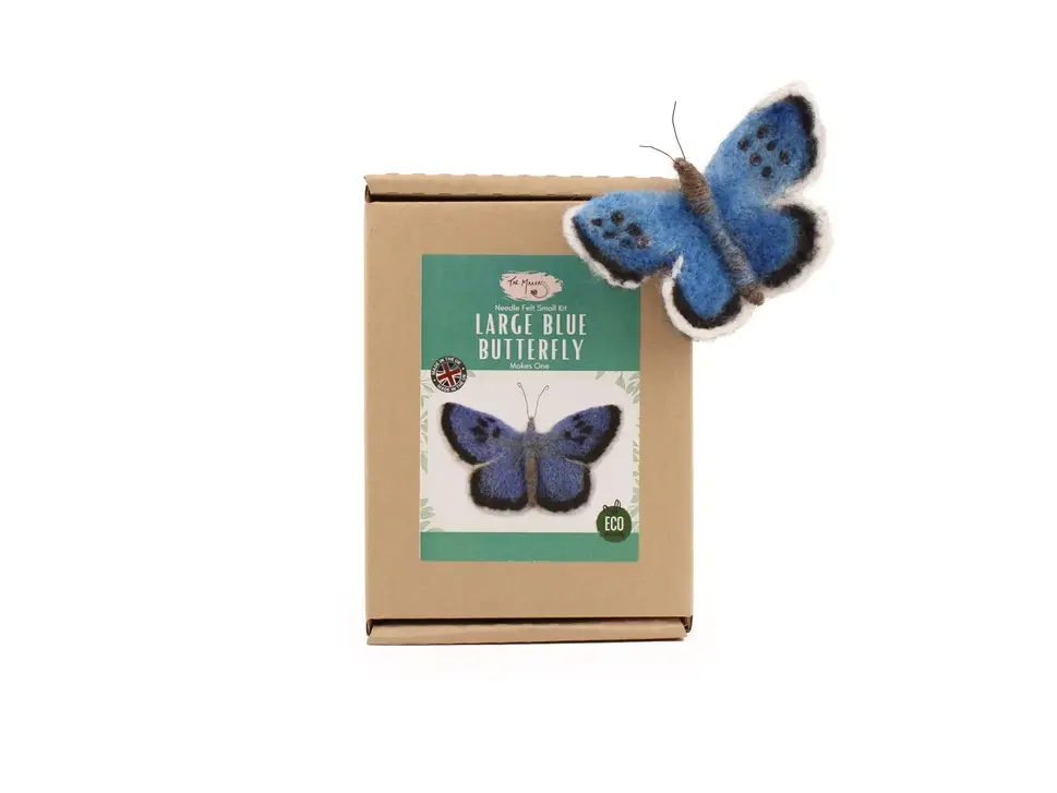 Front view packaging with a blue butterfly perched on the right corner