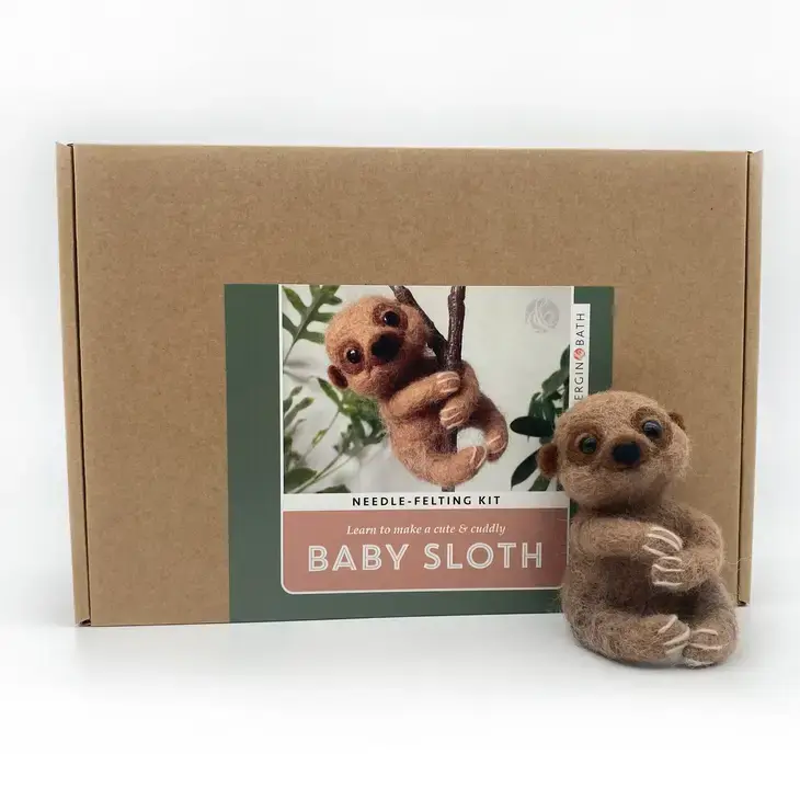 Brown box with sloth labels and baby sloth sitting in front.