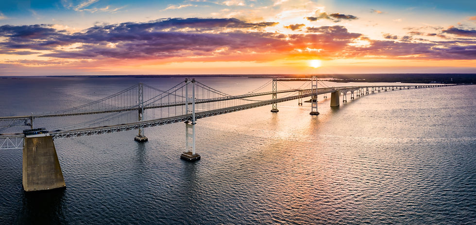Aerial panorama of Chesapeake Bay Bridge at sunset. The Chesapeake Bay Bridge (known local
