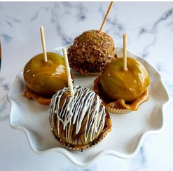 Caramel apples different toppings.jpg