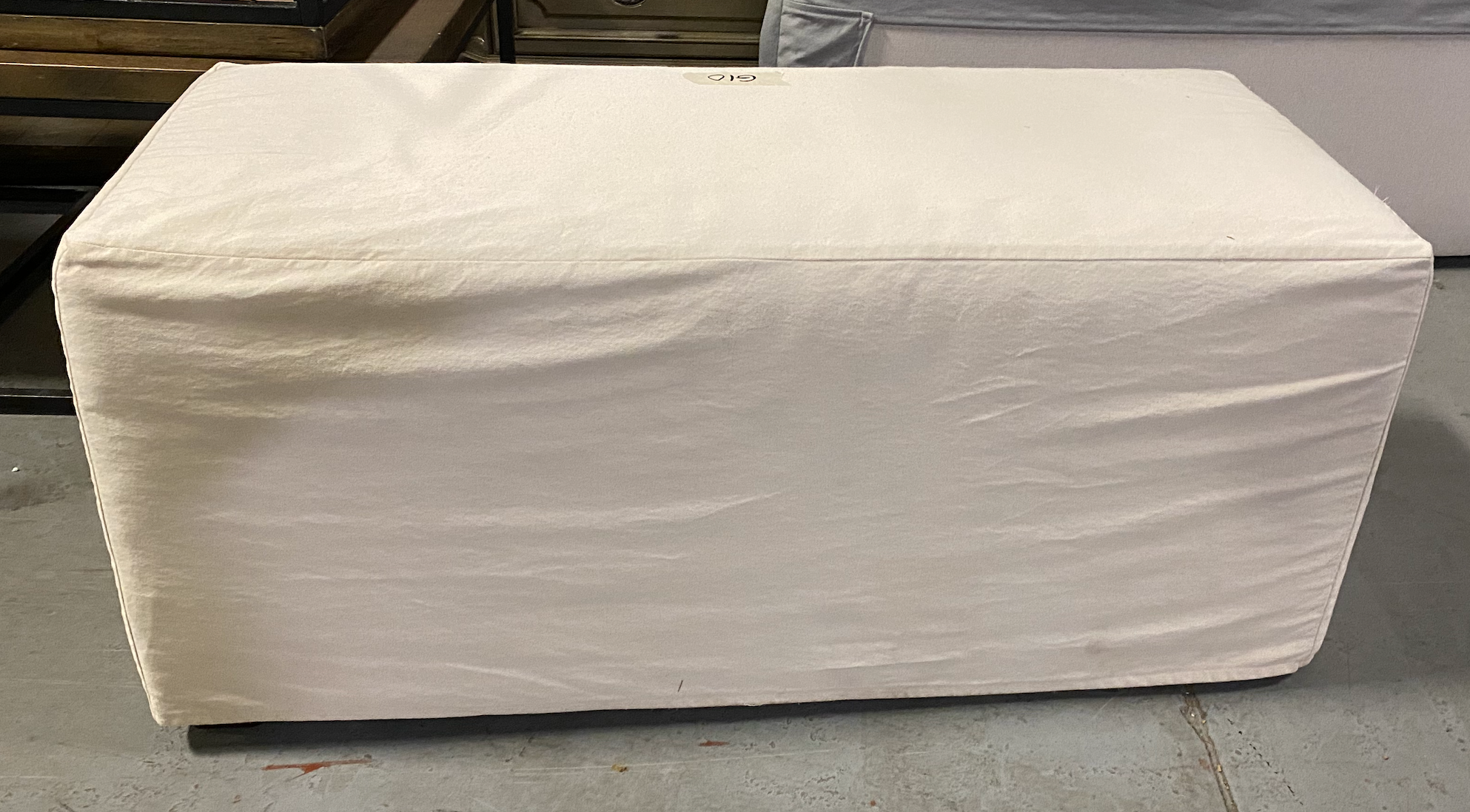 Custom White Slipcovered Bench