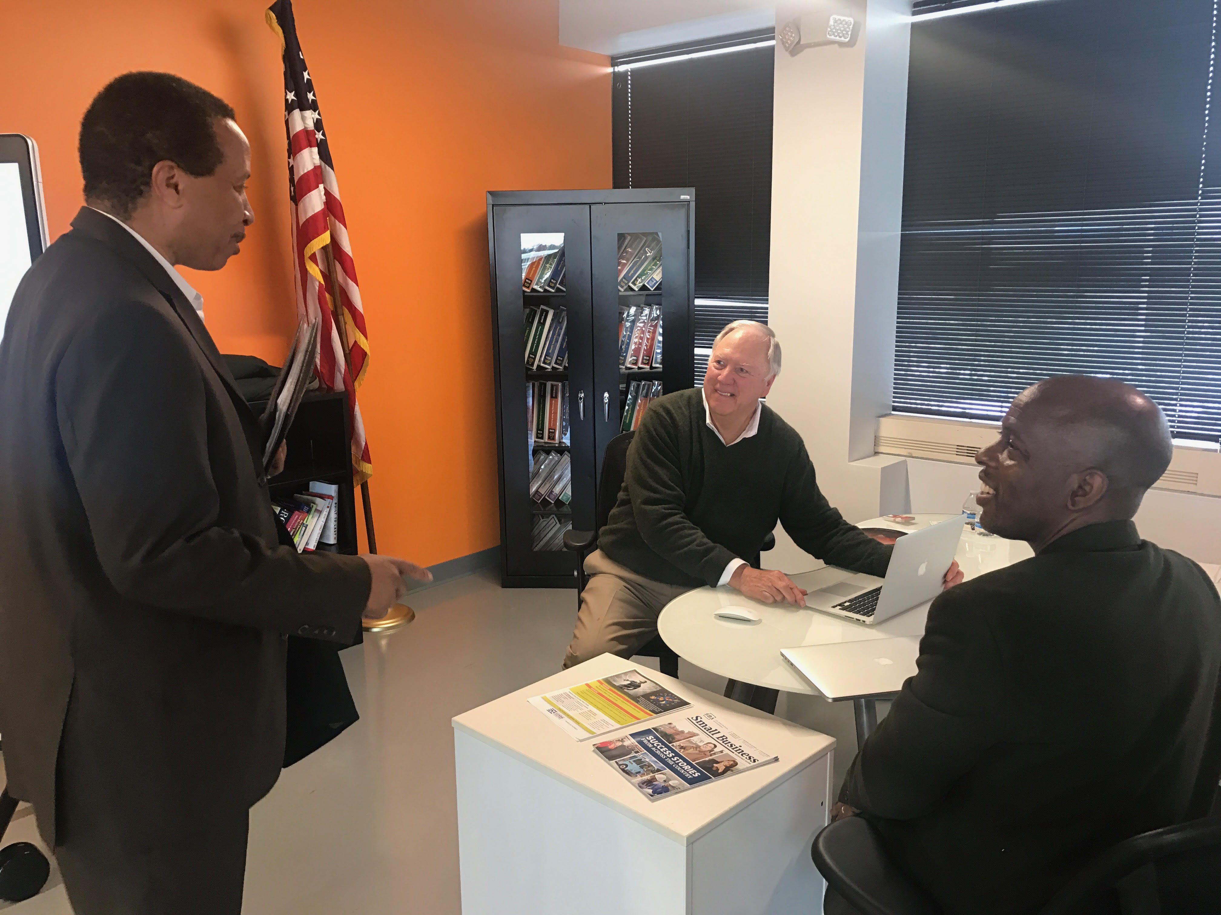 PTAC Counselor talking to clients